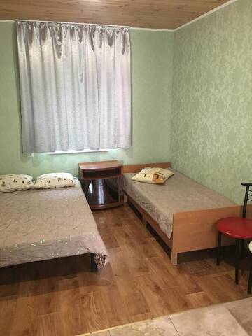 Фото номера Двухместный номер с 2 отдельными кроватями и собственной ванной комнатой Гостевой дом U Ruslana г. Геническая Горка 13